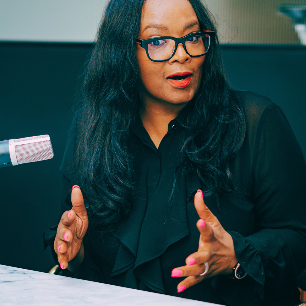 April Gregory, Portrait of [Your Name], a brand and marketing strategist, owner of Wonder Woman Marketing, and creator of the Signature Offer and We Wrap Station.